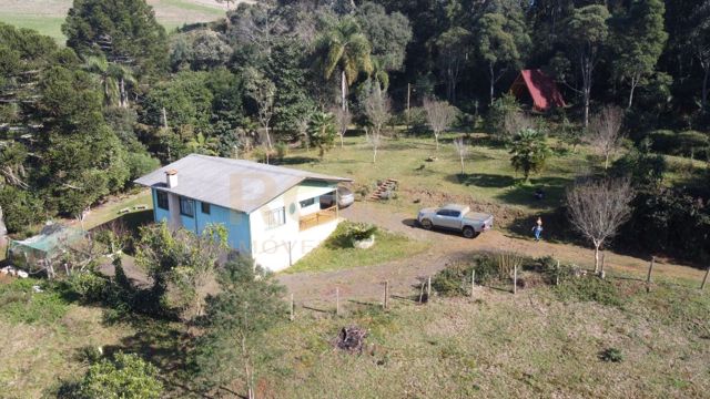 CHÁCARA COM CHALÉ E CASA A 10 MINUTOS DE CAÇADOR